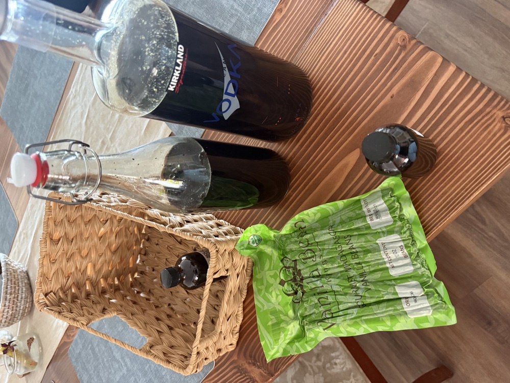 Vanilla beans, vodka, and homemade vanilla extract ready to steep